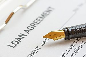 a home loan agreement being refinanced with the help of a Sterling, VA title company