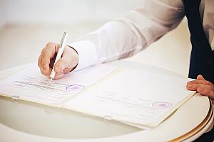 a title agent signing important legal documents