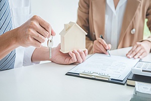 Woman filing for fixed mortgage rate 