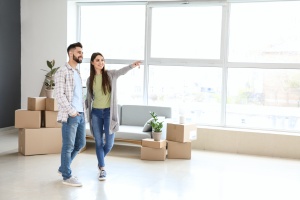 young couple using Real Estate Settlement Services 