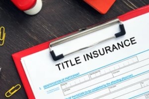 title insurance written on paper for title policies for owners